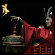 Demonic woman in a red kimono facing a bird in flames – gothic portrait and digital vanity. – creation 588 by Cyb